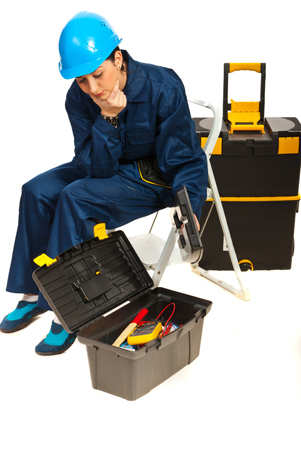 Thinking worker woman with tools box
